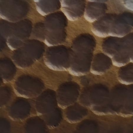 Large hammered stainless steel sheet in antique bronze finish