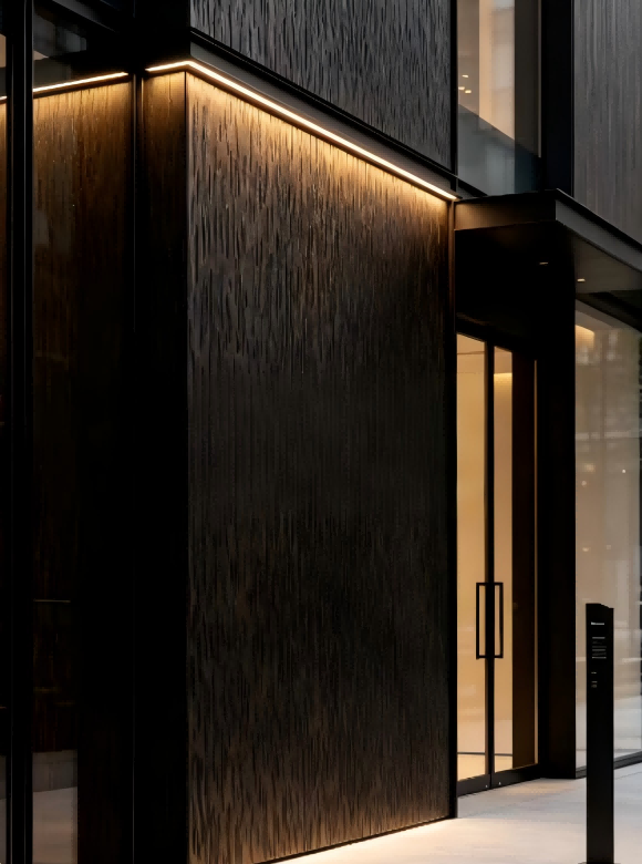 wood-grain-embossed-stainless-steel-facade-building-entrance